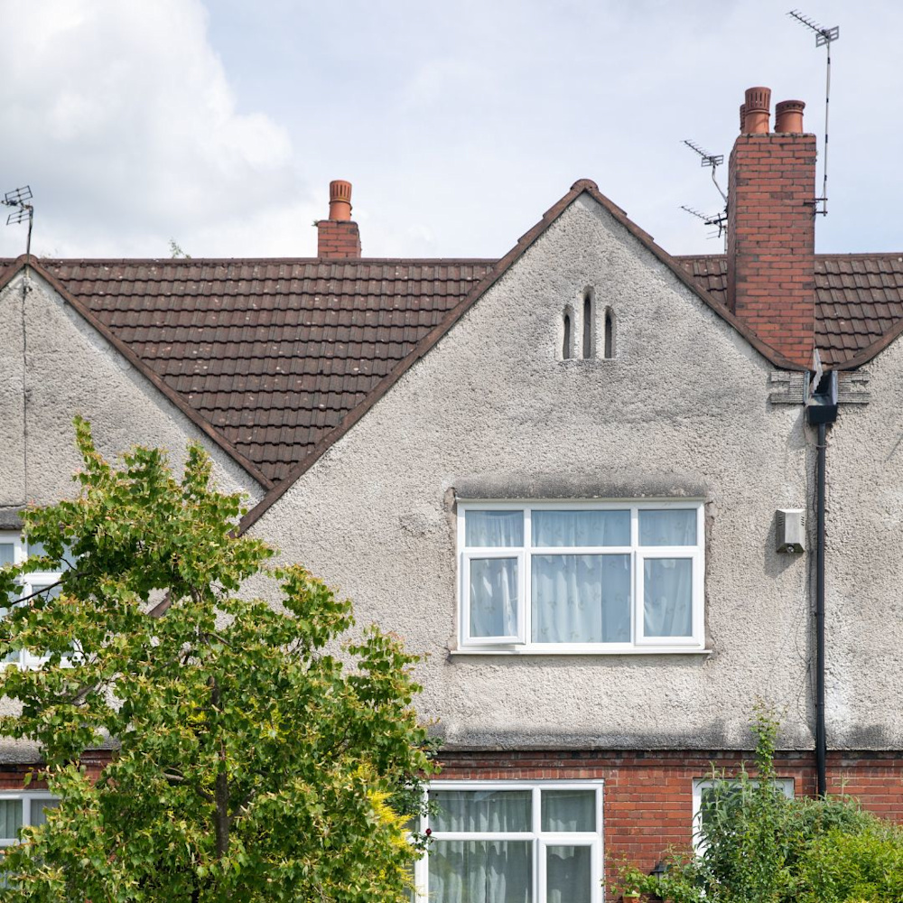 The front of a terraced house in suburban England.