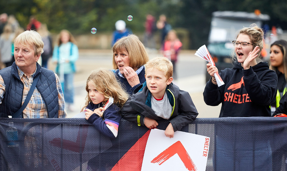A group of Shelter supporters watching an event