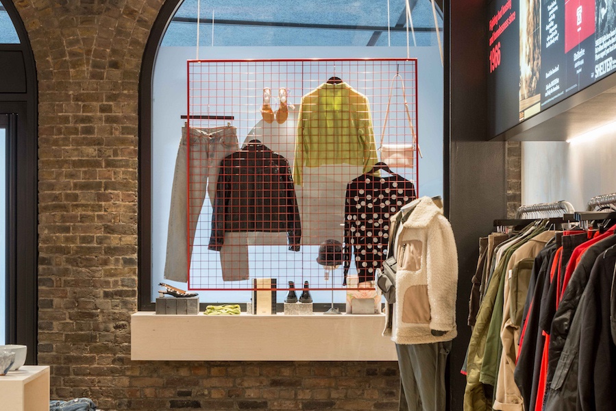 A display of jeans and denim jackets hang in the window at our King's Cross Boutique