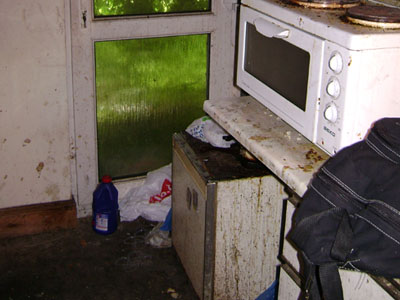 Shocking disrepair in a kitchen.