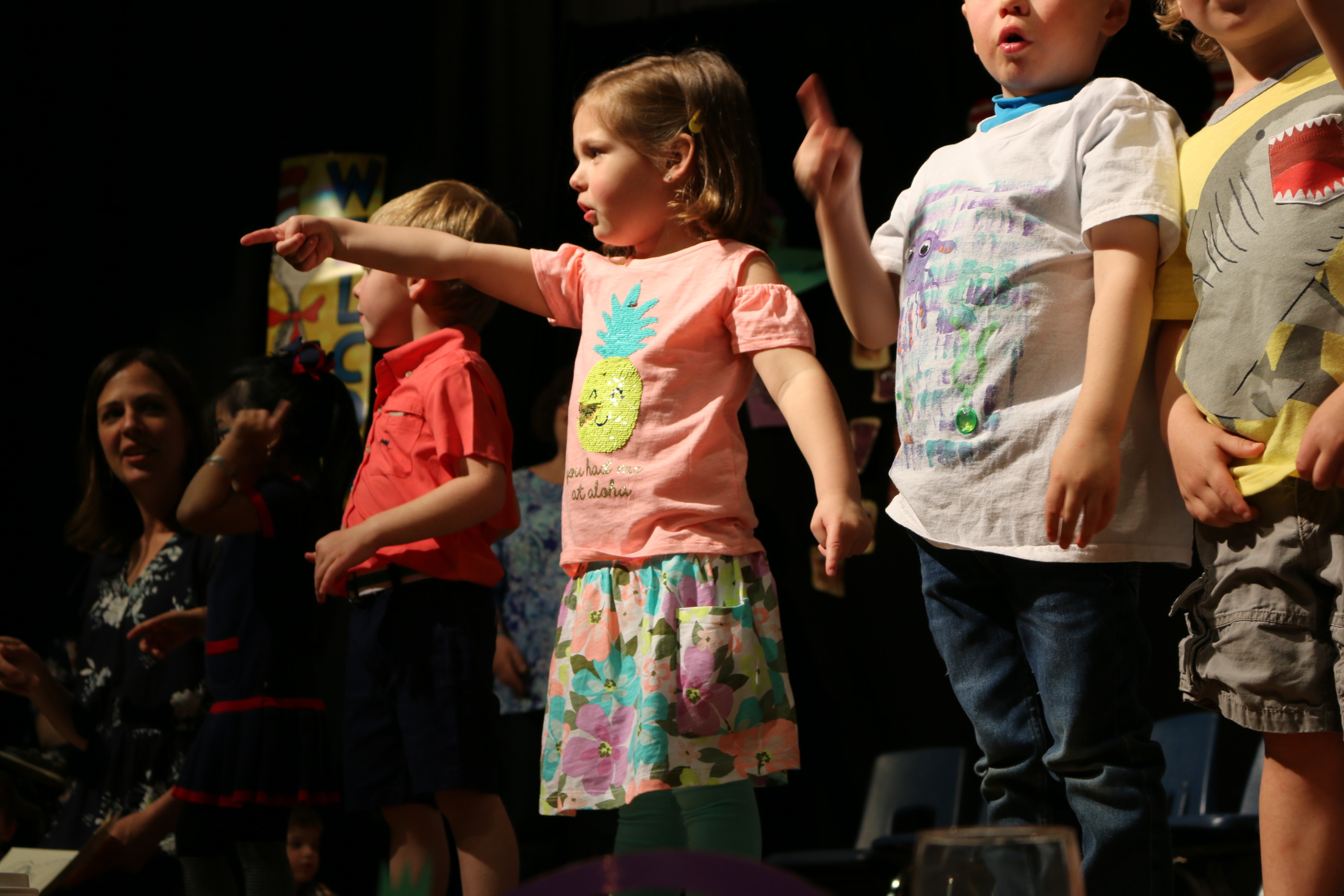 little girl performing on stage