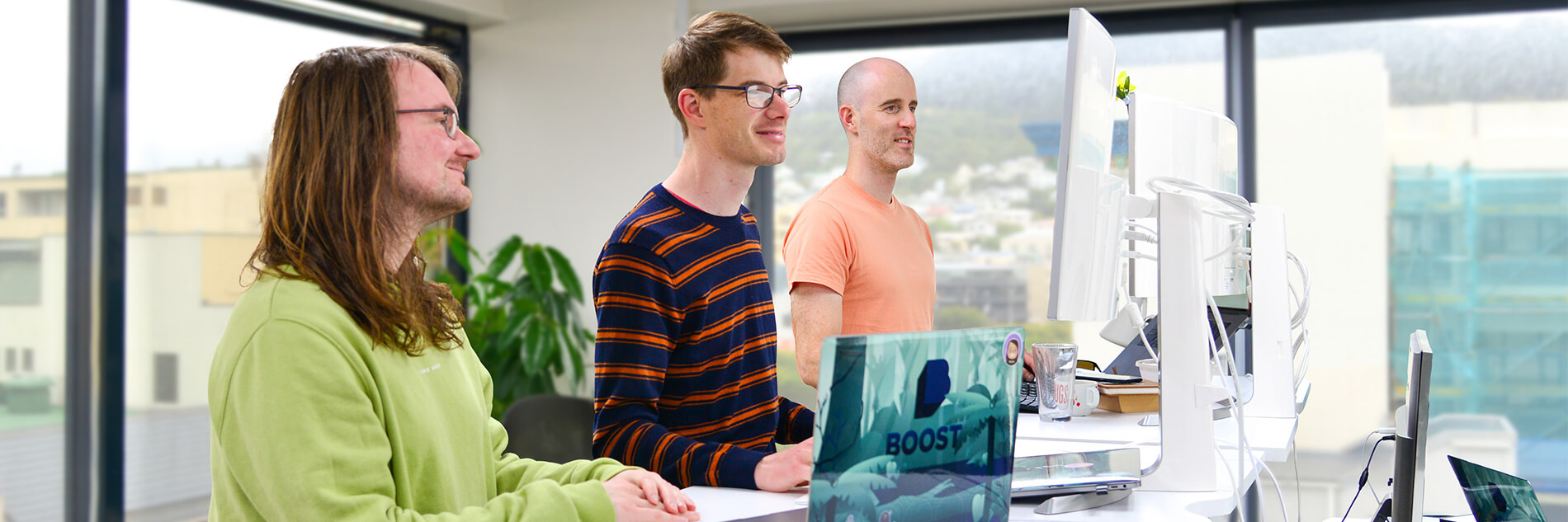 Three of the developers at Wellington mobile app development company Boost.