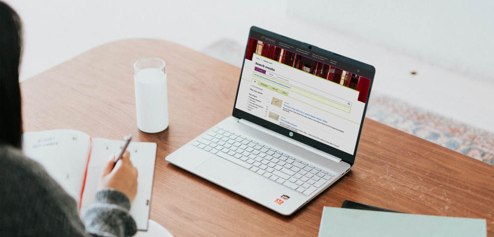 Running a search on the Archives website on a laptop.