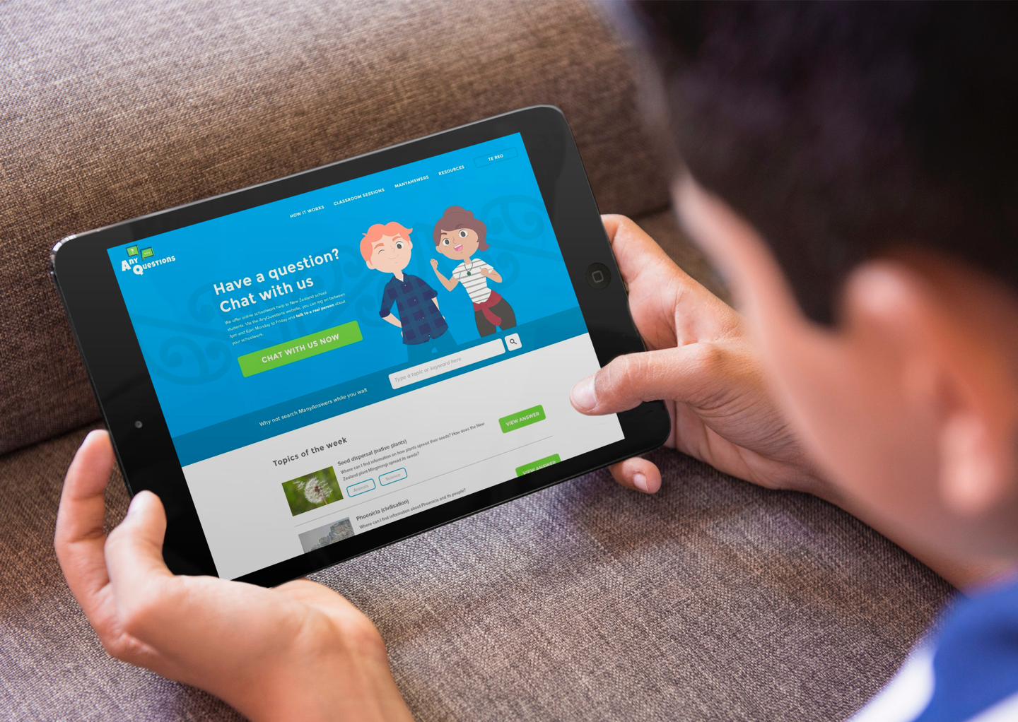 A schoolkid using the AnyQuestions website on a tablet.