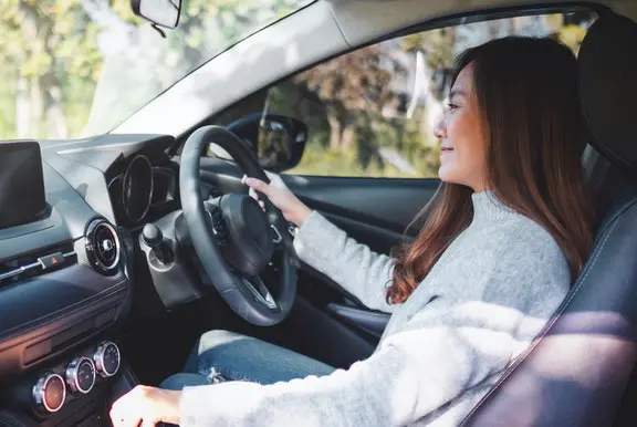 Woman driving car