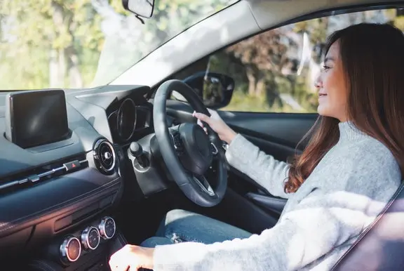 Woman driving car
