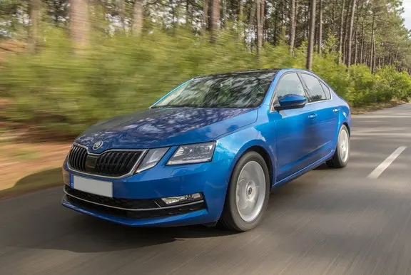 The front exterior of a blue Skoda Octavia