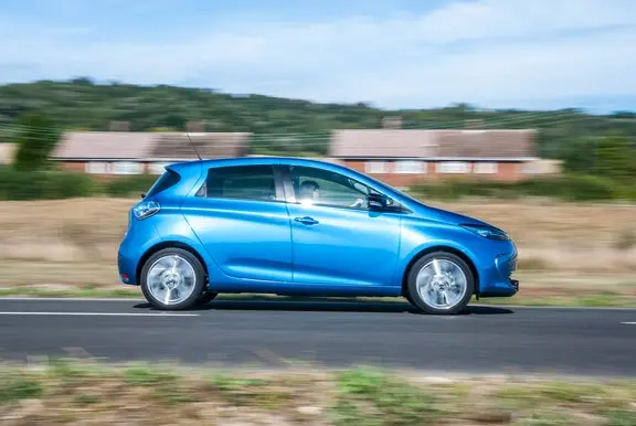 The side exterior of a blue Renault Zoe