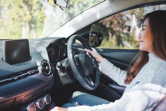 Woman driving car