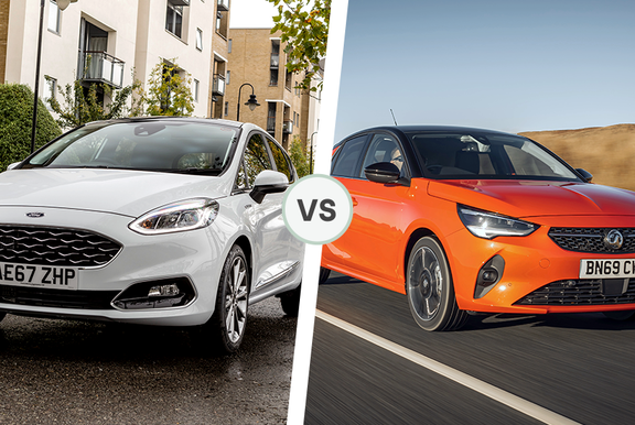 White Ford Fiesta compared to red Vauxhall Corsa