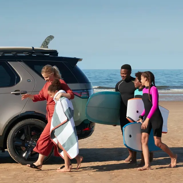 Land Rover Discovery with family