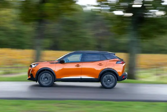 Peugeot 2008 side view orange