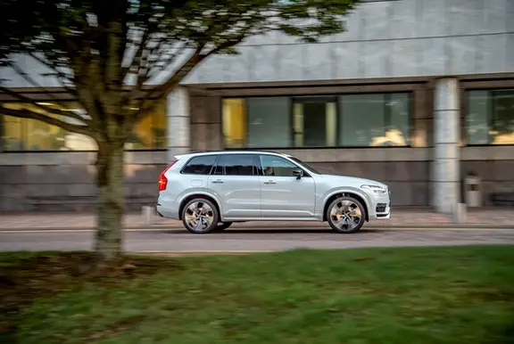 The side exterior of a white Volvo XC90