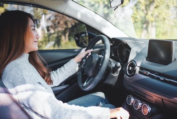 Woman driving car