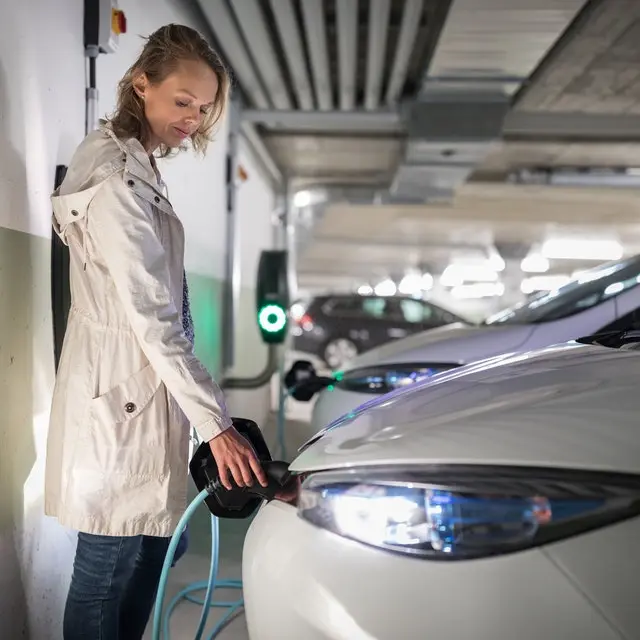 An electric car being charged up