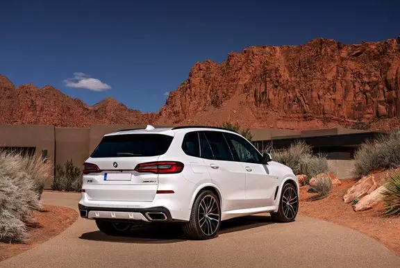 The rear exterior of a white BMW X5