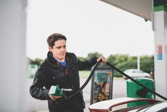 Man at a petrol pump