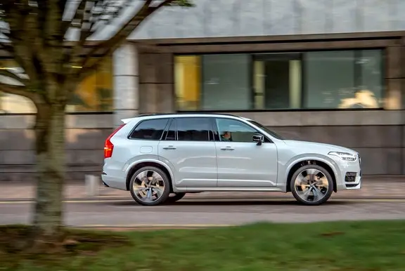 The side exterior of a white Volvo XC90