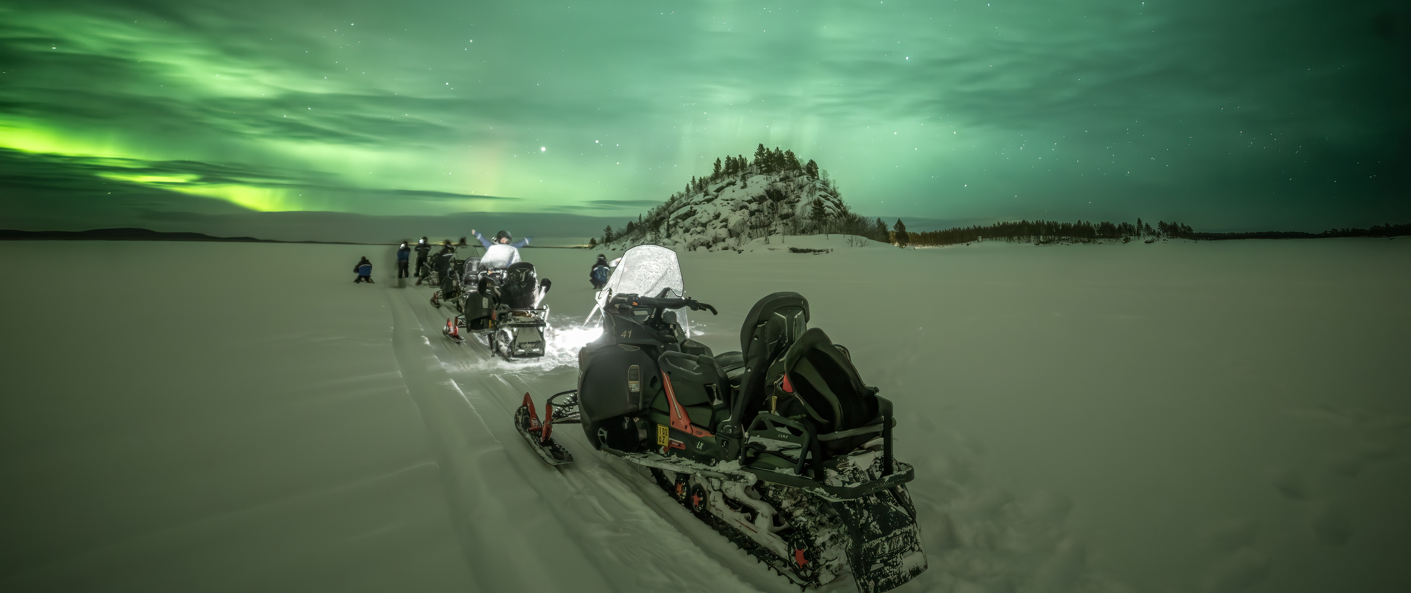 Web banner Finland inari aurora snowmobiles by Lari Laasjarvi