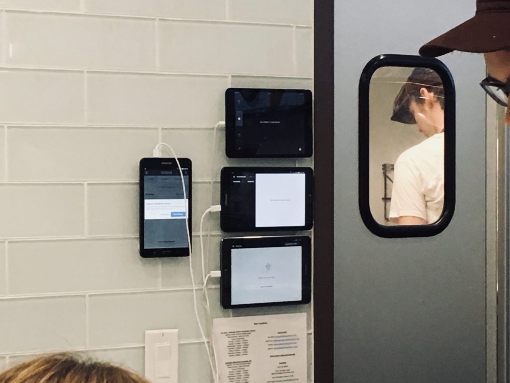 Food Delivery App Wall of Tablets