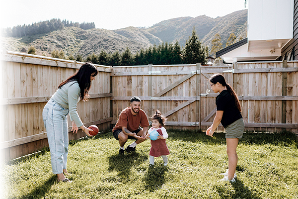 family playing in yard