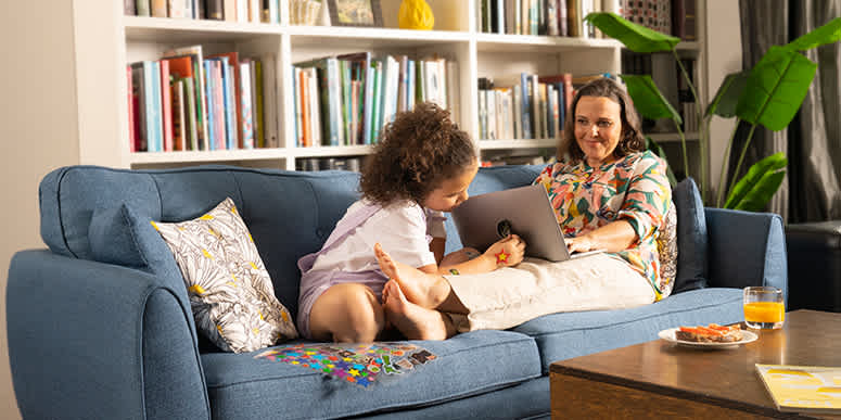 Mum and child on couch