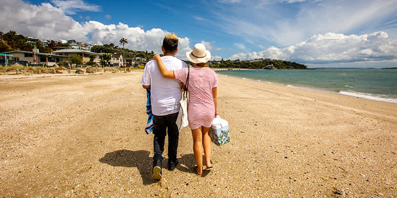 Couple walking on beach