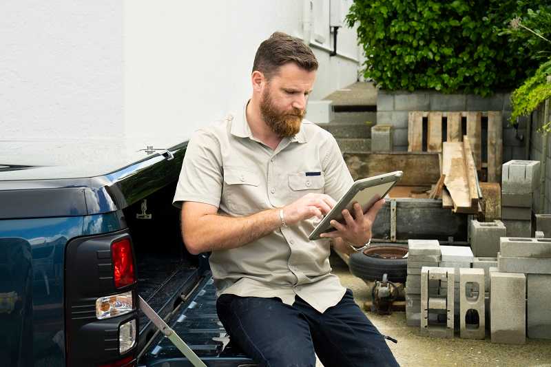 Small business owner doing research on a tablet