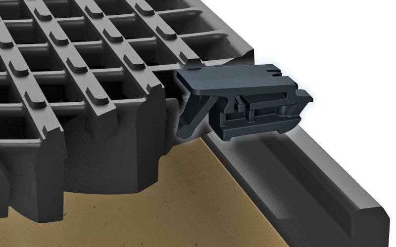 Detailansicht eines Befestigungsmechanismus für Bodenplatten.