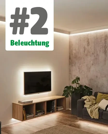 modernes Wohnzimmer mit indirekter Beleuchtung am Deckenübergang