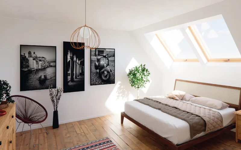 Schlafzimmer im Dachgeschoss mit großen Dachfenstern