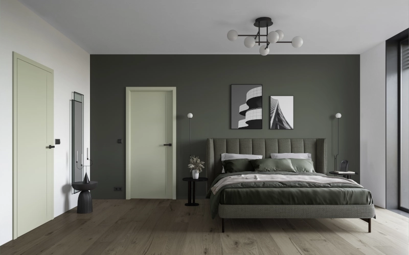 Modernes Schlafzimmer mit einer grauen Wand und einer weißen Tür im Hintergrund