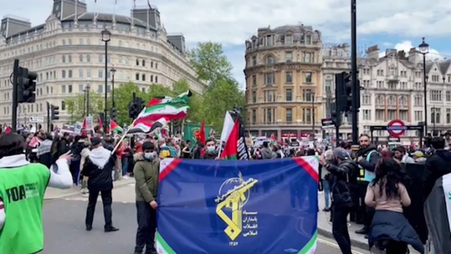 making-case-uk-proscribe-irans-irgc - Figure 2 – An IRGC flag is raised in London during an annual Quds Day rally in 2021