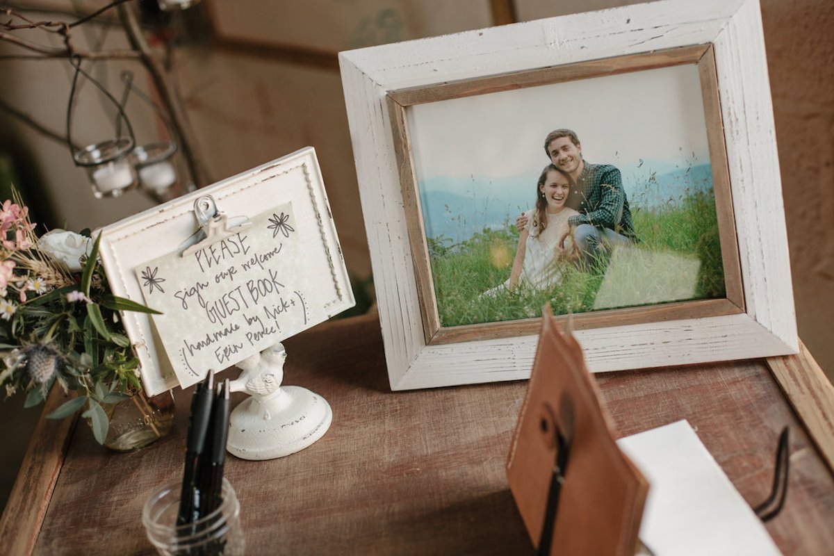 table with decoration pieces and Engagement Photo frame