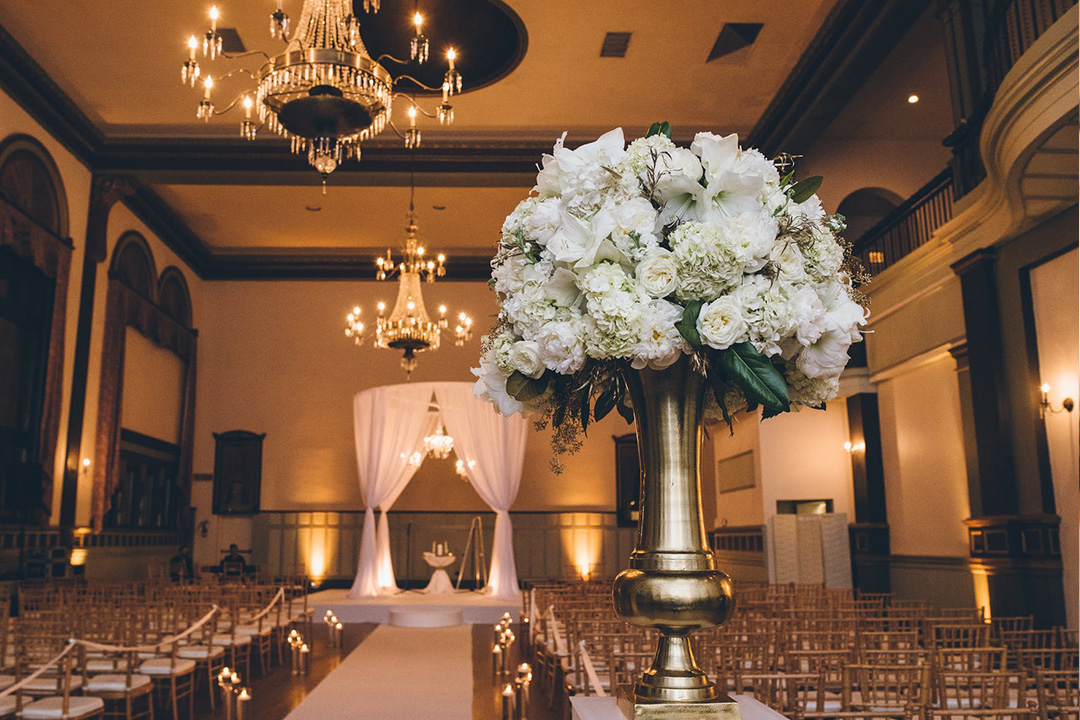 Large wedding venue with white flowers