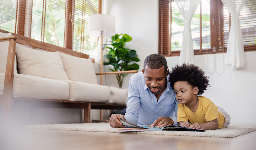 Man Reading to Kid