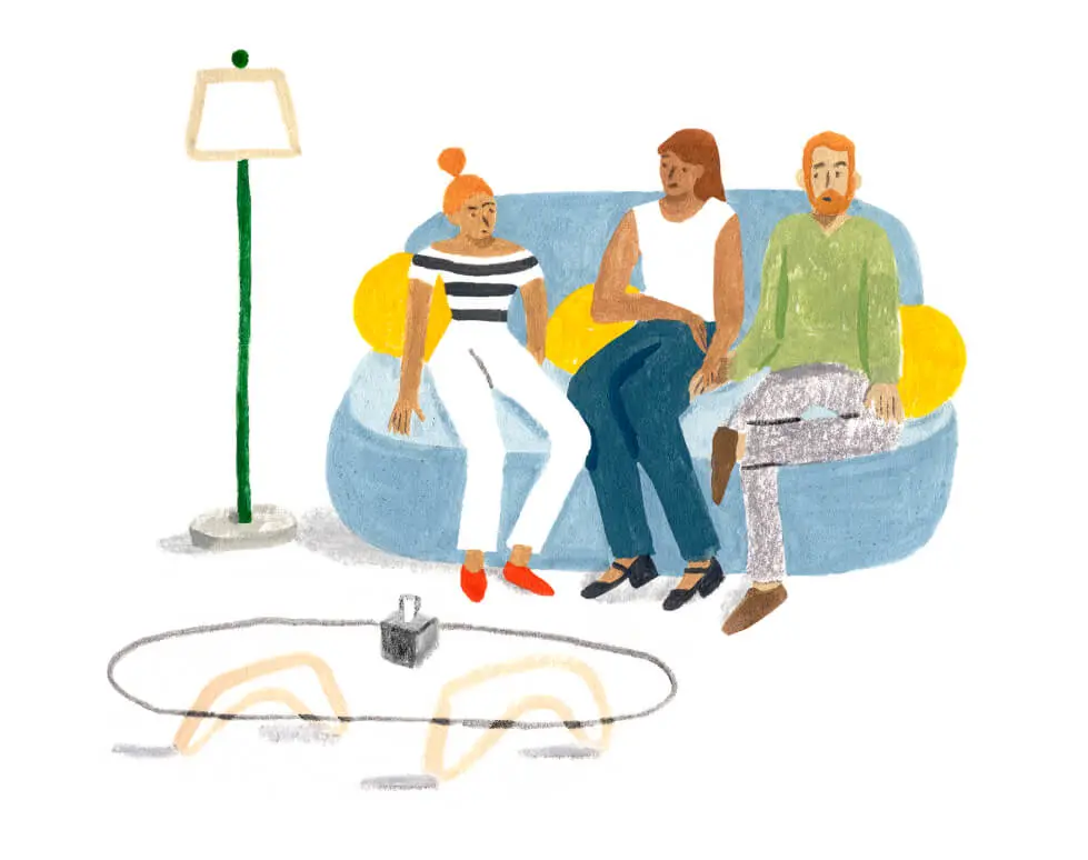 A Monarch by SimplePractice illustration of three people sitting on a blue couch next to a lamp and coffee table.