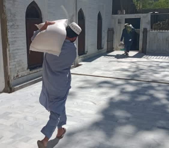 Beneficiary With Donations Picked up from the Masjid