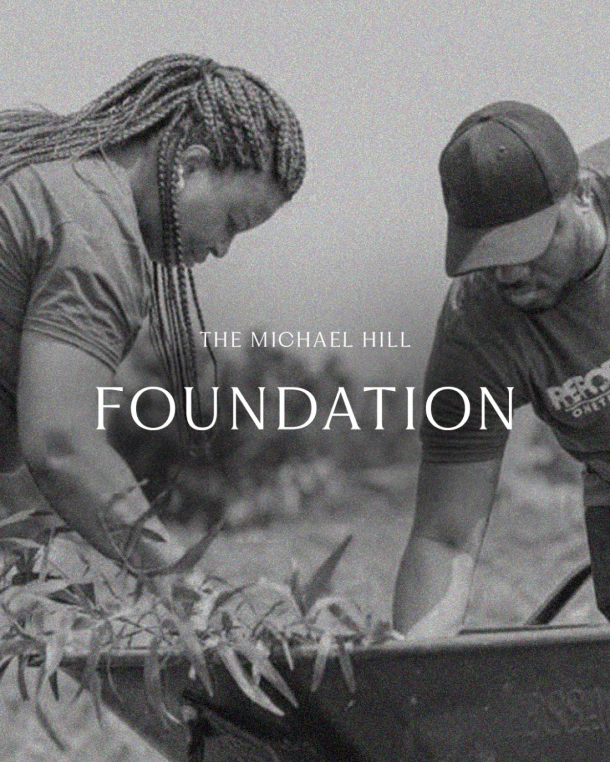 2 people planting trees for the Michael Hill Foundation