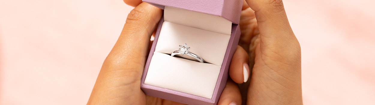 Solitaire ring in box