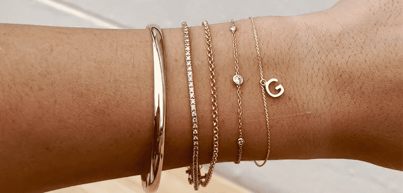 Five bracelets on a wrist