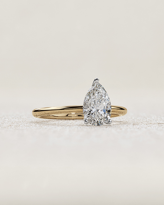 pear cut diamond solitaire engagement ring in yellow gold