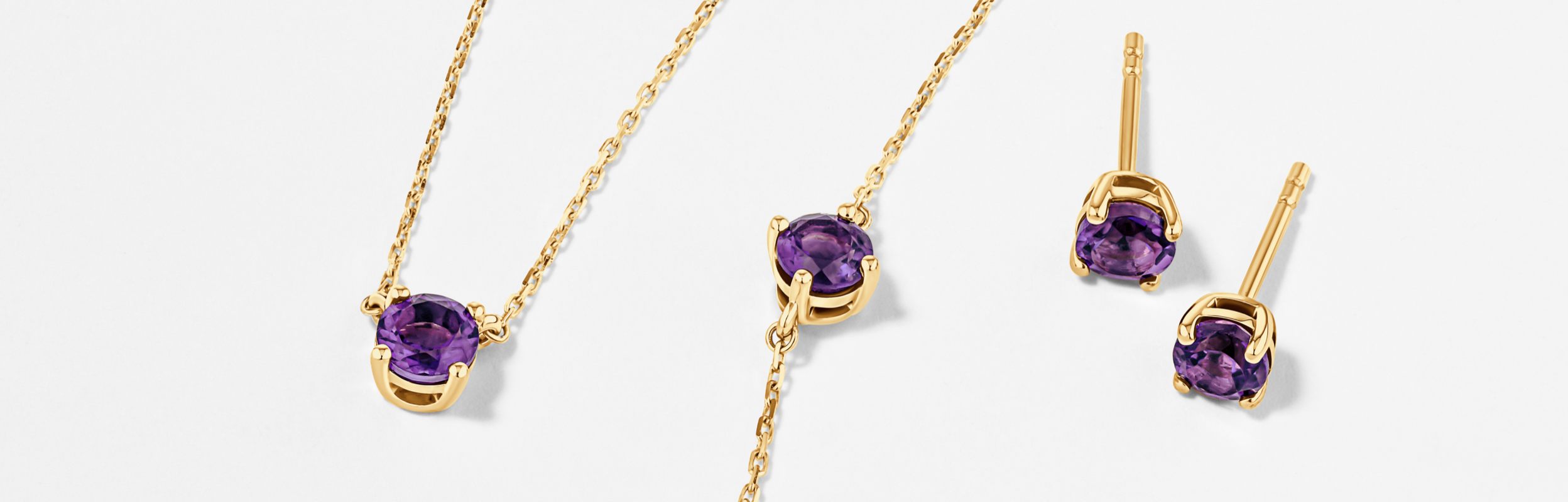 February birthstone amethyst jewellery in yellow gold