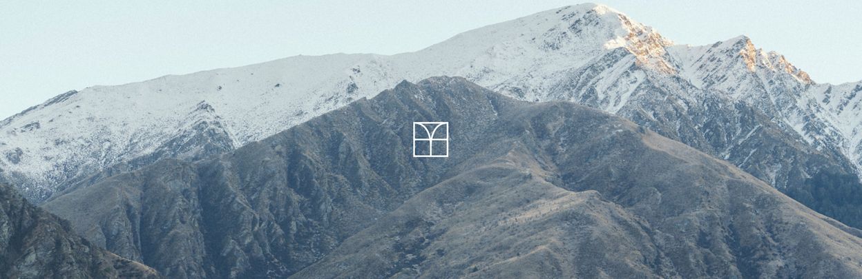 Photo of mountains with Michael Hill brandmark