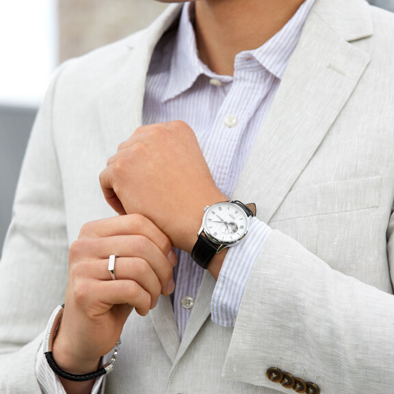 Man pictured wearing watch on right wrist