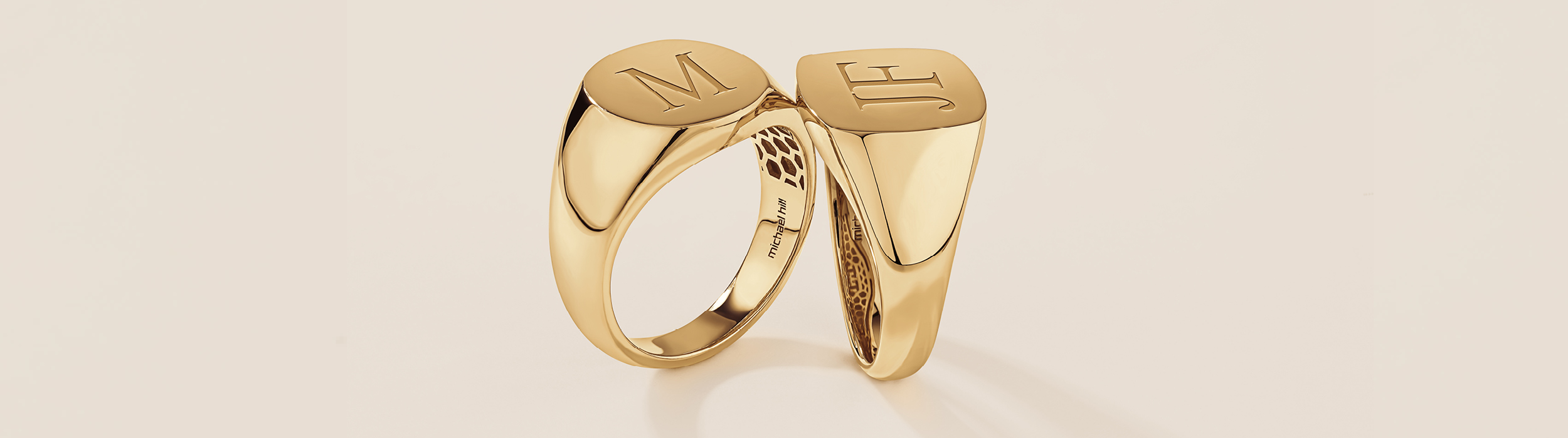 Yellow gold singet rings engraved with initials