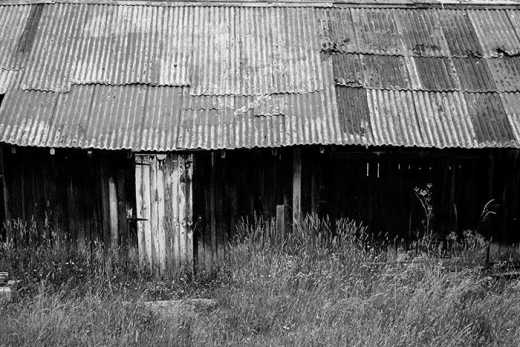 Photograph of old shack building.