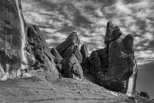 Photograph of giant limestone rock formations standing out against the sky.