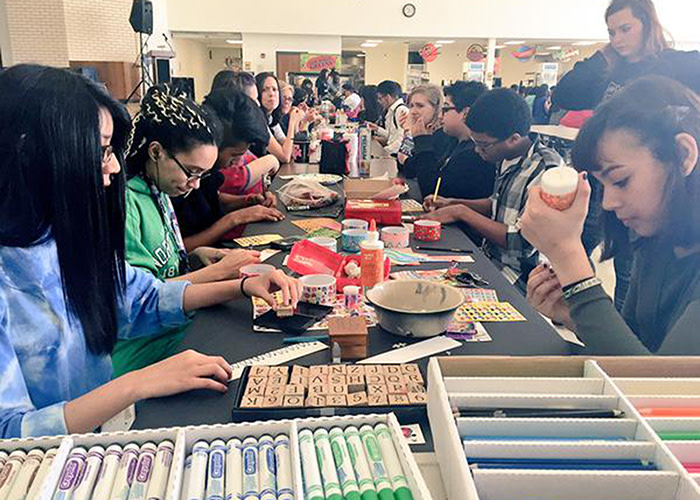 The Grand Prairie Fine Arts Academy team hard at work making bookmarks for the Literacy Challenge.
