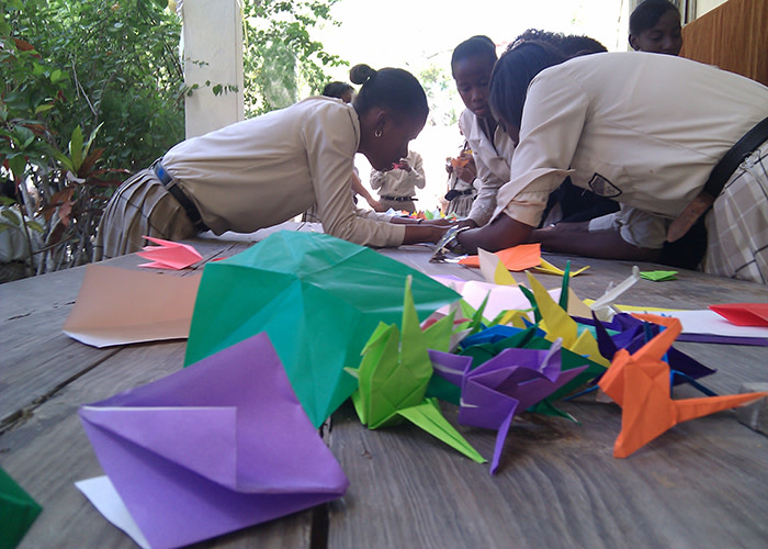 Students in Haiti making cranes for the Challenge!